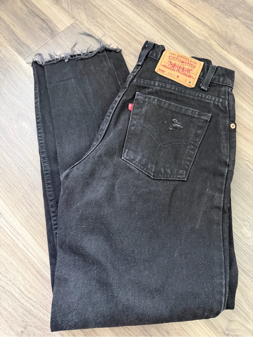 Levi's 550 Black High-Rise Straight Jeans with Frayed Hem